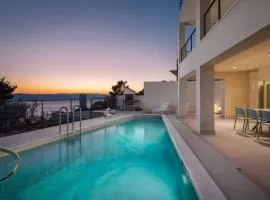 Modern Villa Maris - with heated pool & sea view