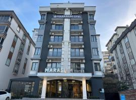 MARASIUM SUITES，位于卡赫拉曼马什拉的酒店