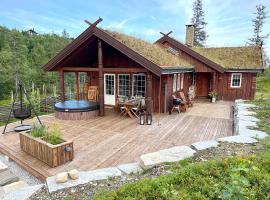 Cozy cabin on Lifjell with jacuzzi close to cross-country trails and hiking trails，位于Lifjell的酒店