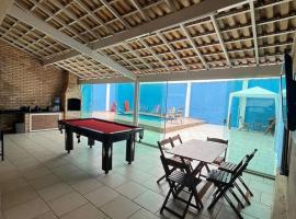 Casa para temporada super confortável 6km praia do forte Cabo Frio，位于卡波布里奥的度假屋