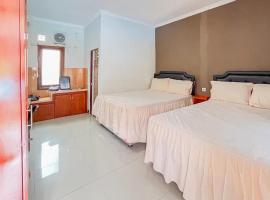Villa Kampoeng City Wonosalam Mitra RedDoorz，位于Jombang的酒店