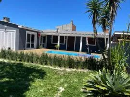 Casa com piscina na praia