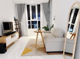 Lá Homestay Apartment，位于龙川市的酒店