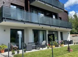 Z Widokiem Apartamenty - apartamenty z widokiem na góry i zewnętrzną balią