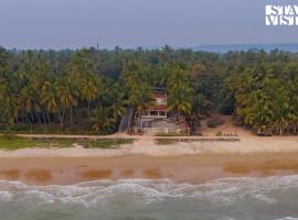 Nautical Nook The Beach Villa- Pet Friendly by StayVista，位于马尔万的酒店