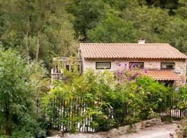 La encantadora casa del río de CALDAS DE REIS.，位于卡尔达斯·德·雷斯的酒店