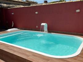 Casa com piscina- condomínio verão vermelho II UNAMAR CABO FRIO，位于卡波布里奥的酒店