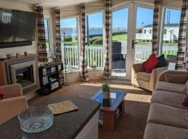 Lovely and Bright Caravan Haven Littlesea with views across the Fleet Lagoon