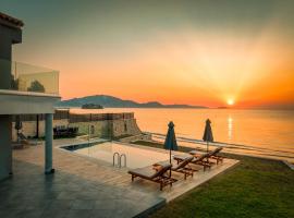 Violet Beach Front Private Villa，位于拉加纳斯的酒店
