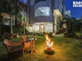 StayVista at Pandav Greens with Lawn & Bonfire