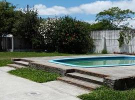 Casa piscina na praia Laranjal，位于佩洛塔斯的酒店
