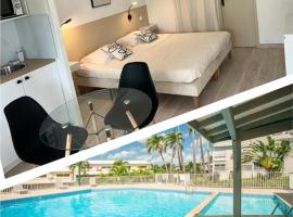 Superbe studio avec Piscine, au coeur de la Marina! Village Soleil !，位于哥西尔的酒店