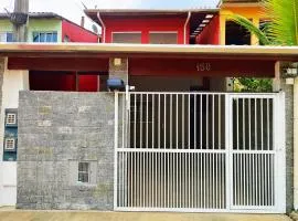 Casa Ubatubana I, em Praia de Maranduba - Ar condicionado, garagem, cozinha completa e Wi-Fi