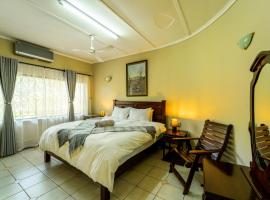 Room in Villa - Zambezi Family Lodge - Lion Room，位于维多利亚瀑布的住宿加早餐旅馆