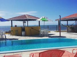 Dunas e Corais Praia Hotel，位于Pitangui的酒店