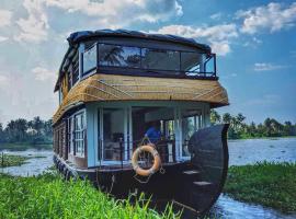 Grand Villa Houseboat，位于库玛拉孔的酒店