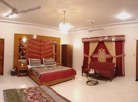 Travel lodge clifton，位于卡拉奇的木屋