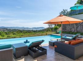 White Monkey Villa - Private Pool & Jacuzzi，位于珍南海滩的带按摩浴缸的酒店