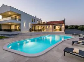 Villa Posidonia near Pula with sea view and surrounded by olive trees