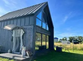 Ferienhaus“ Blaues Wunder“ am Wasser mit Grill