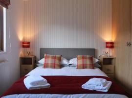 Luxury 3 bedroom lodge with free in lodge wifi，位于康福斯的酒店
