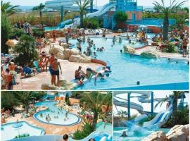 Mobil Home Luxe 3 chambres climatisé Canet en Roussillon，位于鲁西隆地区卡内的酒店