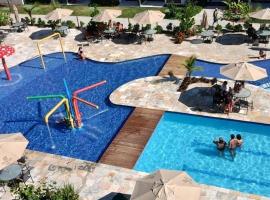 Flat com vista para piscina principal，位于伊波茹卡的度假屋