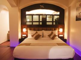 XCELSIOR HOTEL & SPA，位于西隆的酒店