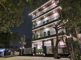 Emerald Suites，位于大诺伊达的酒店