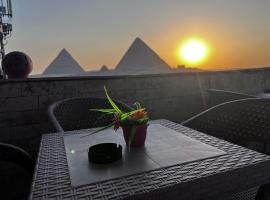 Aton pyramids INN，位于开罗的酒店