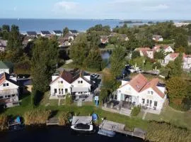 familienfreundliches Ferienhaus mit Ruderboot, Sauna und Kamin sowie E-Ladestation