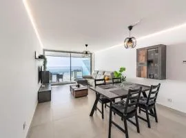 Serene Seaview Retreat in Higueron: 2BR Oasis