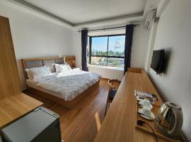 PALM VILLAGE BUSINESS HOTEL APT，位于达累斯萨拉姆的酒店