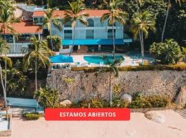 Maravillosa casa con 7 habitaciones, acceso directo a playa pichilingue, bahía de puerto marqués, zona diamante Acapulco
