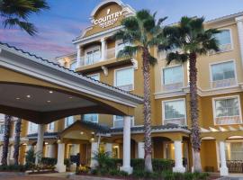 佛罗里达州橘子港代顿雷迪森乡村套房酒店 ，位于珀特奥兰治卡丁车城附近的酒店