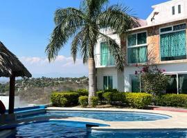 casa con hermosa vista al lago de tequesquitengo，位于特克塞丁戈的酒店