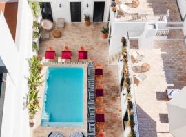 Casa Rosa Villa with Pool in Olhao Centre，位于奥良的带泳池的酒店