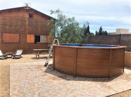 Carmeta - Casa Rural de madera con jardín, piscina privada y barbacoa - Deltavacaciones，位于L'Eucaliptus的酒店