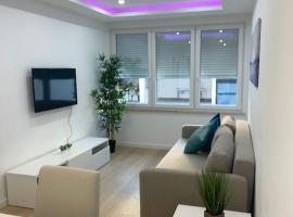 Lovely 2 bedroom apartment in South Lisbon，位于巴雷鲁的酒店