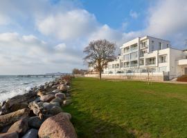 Ostseeresidenz Sassnitz F548 WG 5 mit Sauna, Terrasse, Meerblick，位于萨斯尼茨的酒店