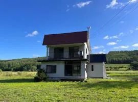 House surrounded by beautiful nature.