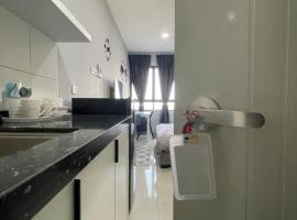 Horizon Snug Suite Sepang KLIA, Parking, WiFi -R，位于Kampong Melot的自助式住宿