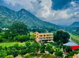 Udai Valley Resort- Top Rated Resort in Udaipur with mountain view