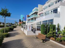 Strandallee - Ferienapartments direkt am Strand von Haffkrug，位于哈夫克鲁格的酒店