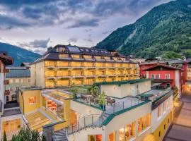 Hotel Norica - Thermenhotels Gastein mit dem Bademantel direkt in die Therme