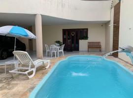 Casa 3 suítes com piscina，位于纳塔尔Seaway Shopping Mall附近的酒店