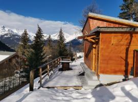 Petit chalet Valfréjus pied des pistes，位于莫达讷蓬塔巴尼亚滑雪缆车附近的酒店