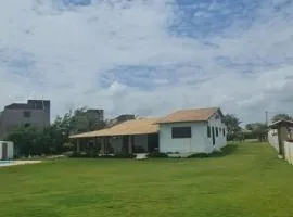 Casa Medalhão Pé na Areia