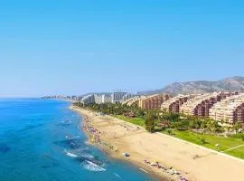 Primera línea de playa, pies en la arena