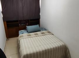 Quarto Pernoite em apartamento Guarulhos Aeroporto Fast Sleep Individual，位于瓜鲁柳斯的民宿